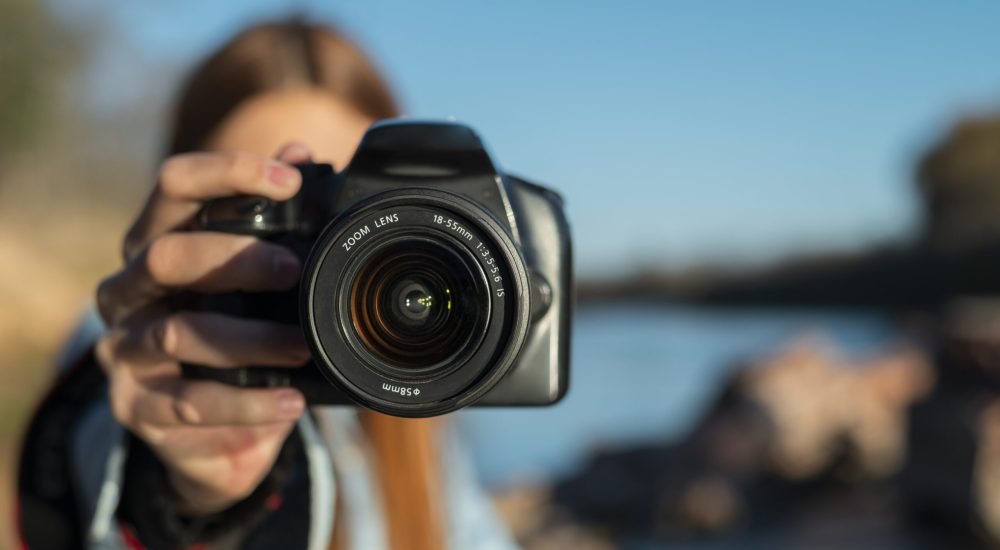 front-view-photographer-with-camera